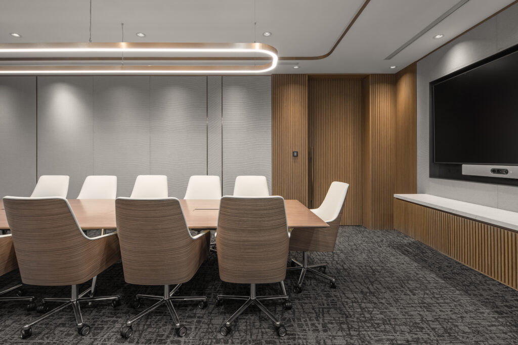 An office interior fit-out meeting room with a TV screen centrepiece