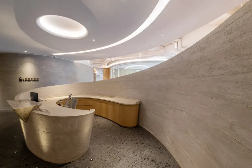 Legend Interiors Hong Kong office reception area featuring modern interior office fit-out design and professional fit-out project management for commercial workspace renovation.