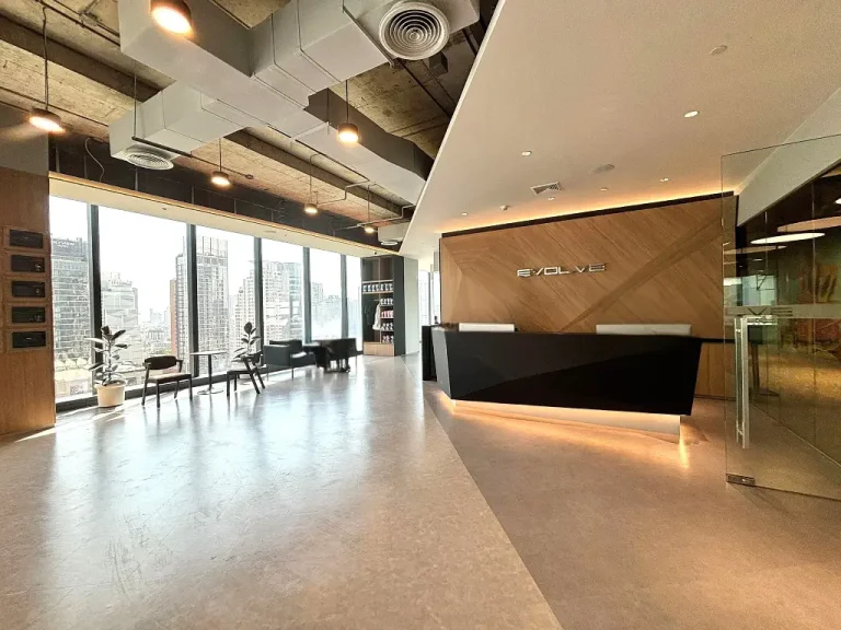 fit-out contractor delivering a modern office reception in Thailand with sustainable design and city views