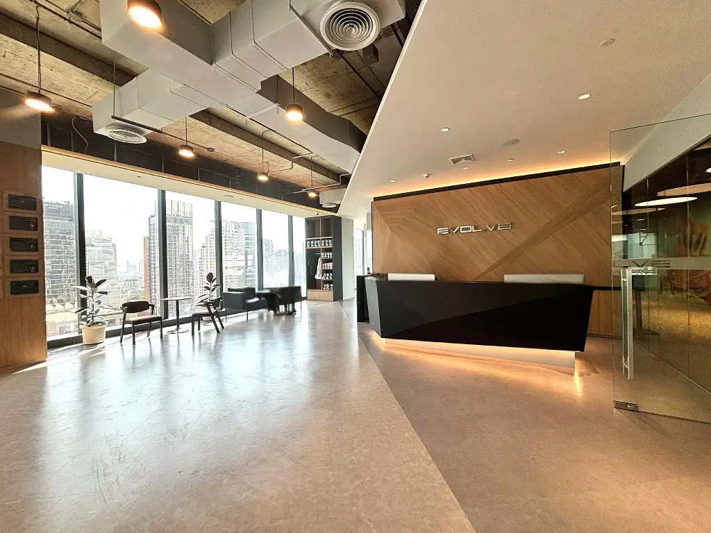 fit-out contractor delivering a modern office reception in Thailand with sustainable design and city views