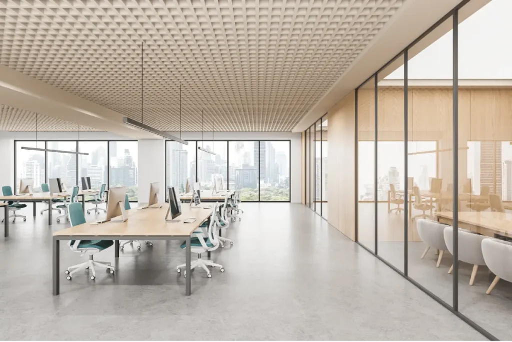 Spacious office interior with modern workstations, minimalist design style, cityscape background, concept of corporate workspace efficiency.