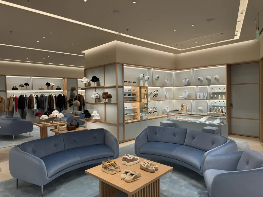 A retail interior fit-out contractor, Legend Interior's project: An apparel display room featuring blue furniture and wooden accents
